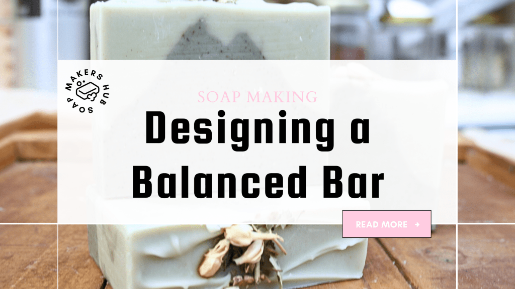 A visually appealing soap bar with a light green color, decorated with a marble pattern, set against a wooden background. The image includes text overlay indicating 'Soap Making' and 'Designing a Balanced Bar'.